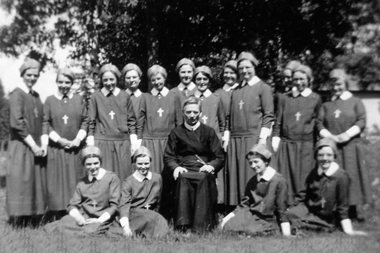Fr. O'Hare with Sisters in Edson