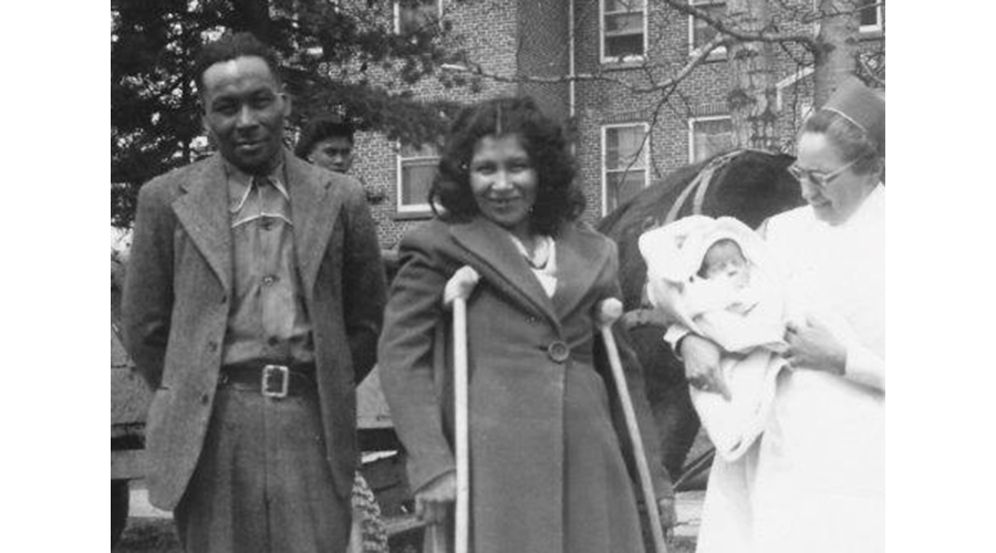 Sister DeMarsh and parents with new infant