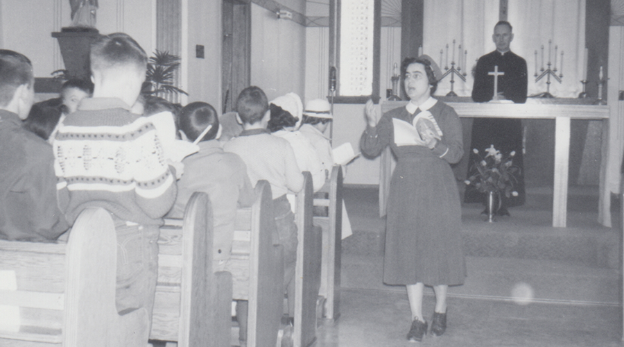 Sister Bernice Anstett leads hymns