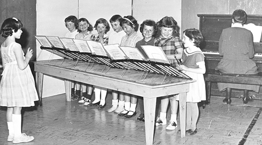 Sister Mary Phillips accompanies student band