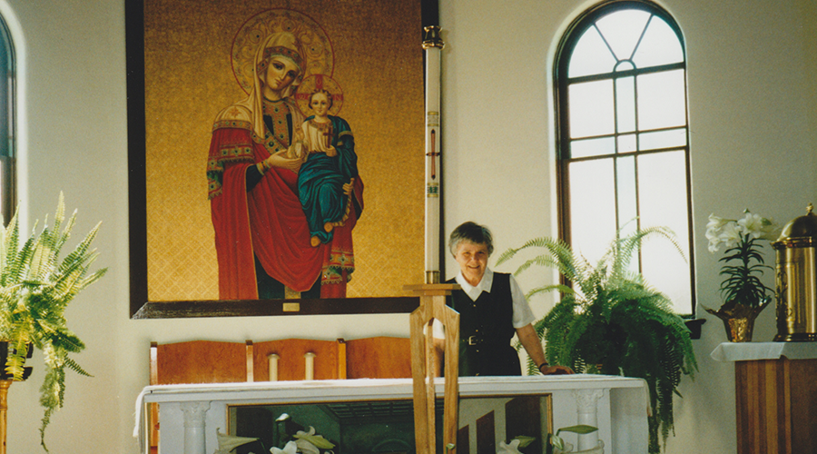 Sister Mary Halder at altar