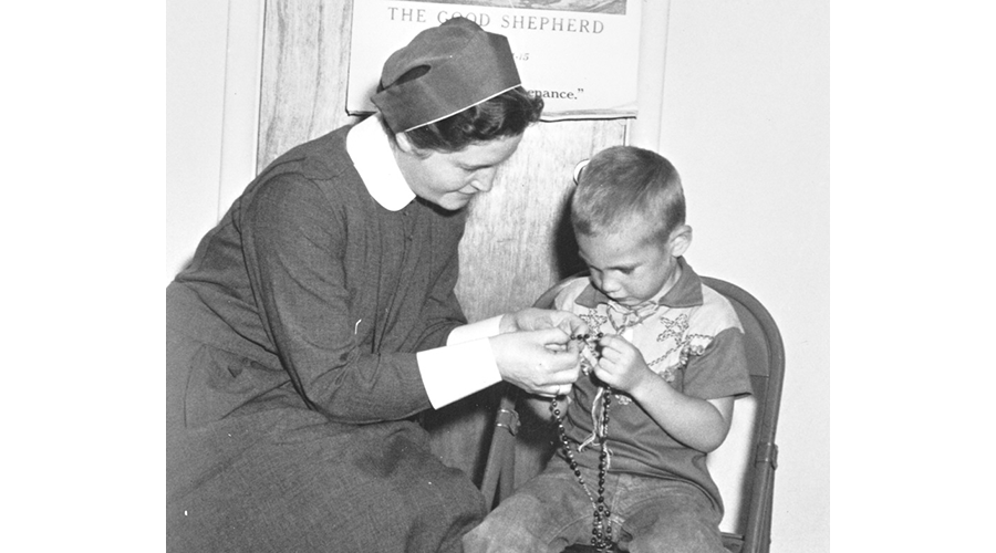 Sister Mary Harding teaches rosary