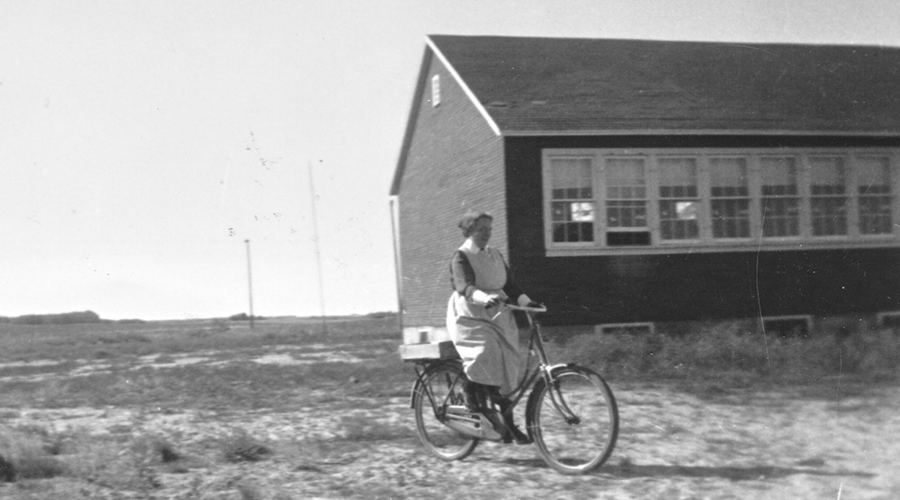 Sister Deland on bicycle