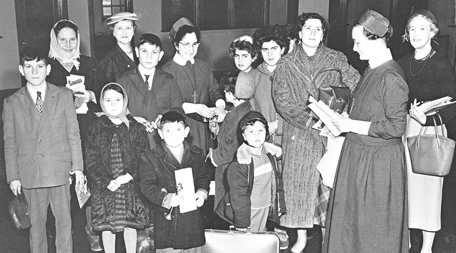 Sisters Liota and Dulaska with immigrants