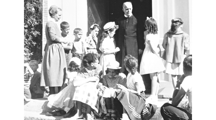 Sister Alice Walsh and students in Oak Lake, MB